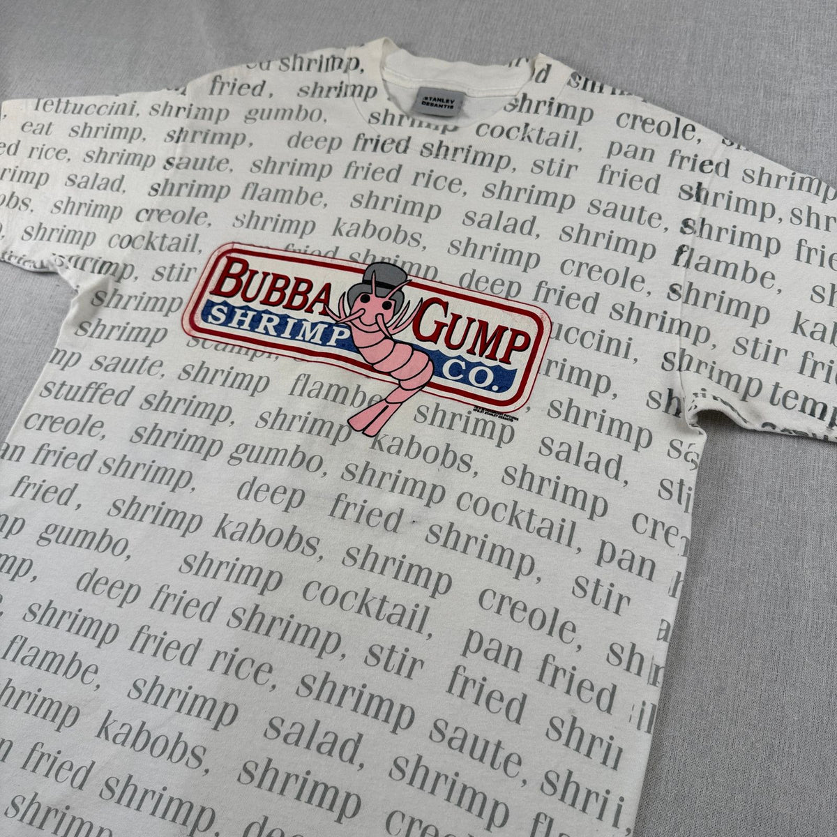 90s フォレストガンプ 映画T Tシャツ BUBBA GUMP えび STANLEY DESANTIS forrest gump シングルステッチ 総柄 USA製 M m-t-2505-023
