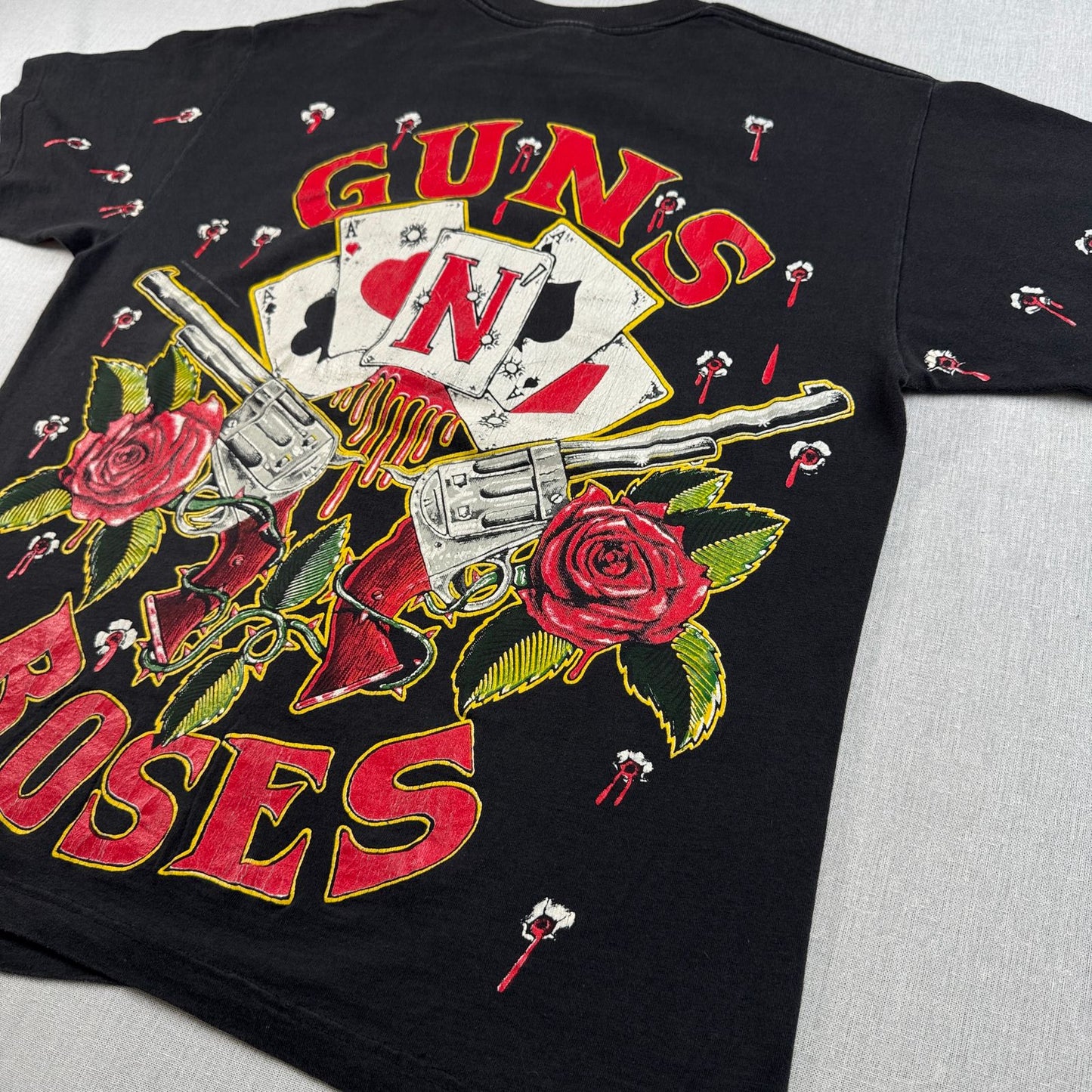90s ガンズアンドローゼス 銃弾 Tシャツ 総柄 USA製 L バンT 黒 L USA WILD OATS ワイルドオーツ Guns N' Roses 音楽 ロック トランプ 拳銃 銃痕 1991 ガンズ 2603-0002