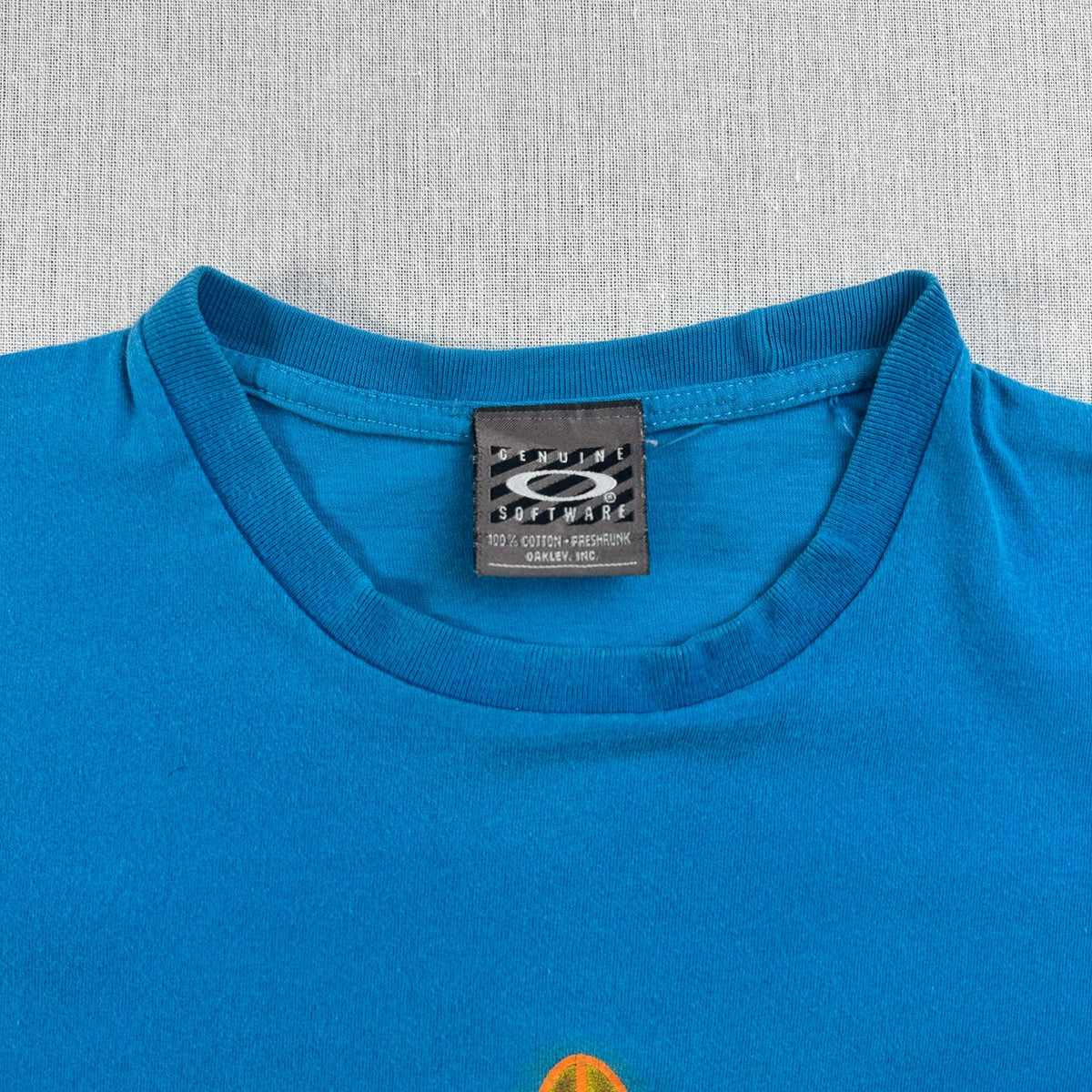 90s OAKLEY オークリー Tシャツ サーフボード surf 青 水色 2603-0291