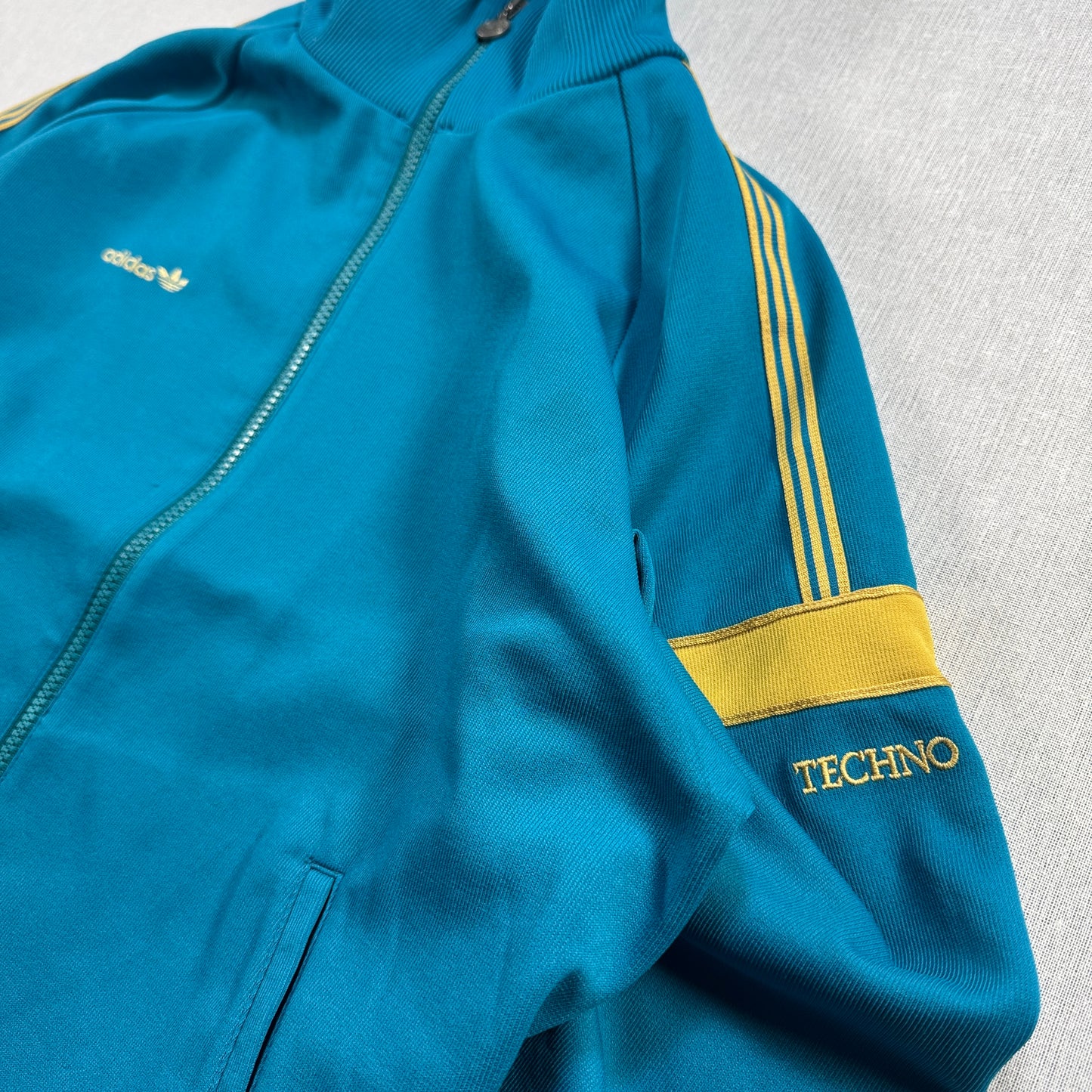 80s アディダス adidas トラックジャケット ターコイズ イエロー L 西ドイツ製 ad-u-2505-060
